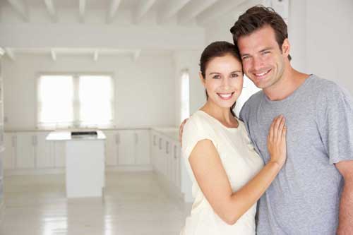 Over forties dating couple in kitchen